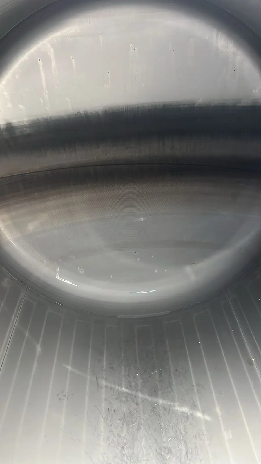 The same ISO tank after a Gentex cleaning: bare stainless head and floor, residue gone